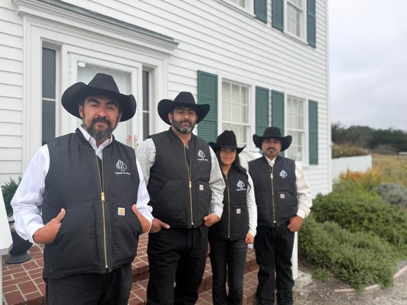 Luis Jimenez and others standing in front of the Johnston House